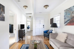 Soak up the Light at a Chic Duplex 6 Blocks From King Street